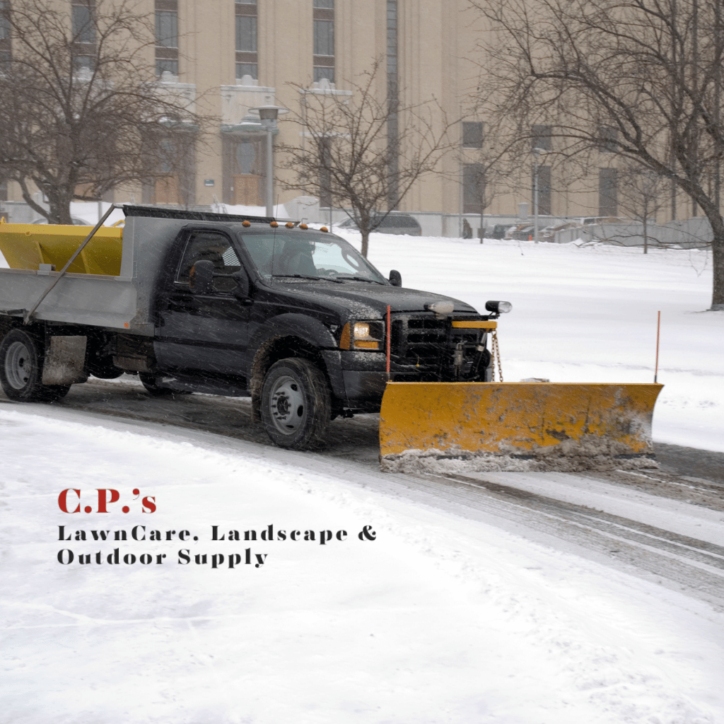 A black pickup truck with a yellow snow plow clears snow from a road in front of a large building. C.P.s LawnCare, Landscape & Outdoor Supply text appears at the bottom left.